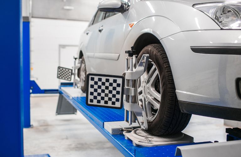 car on stand for wheel Alignment
